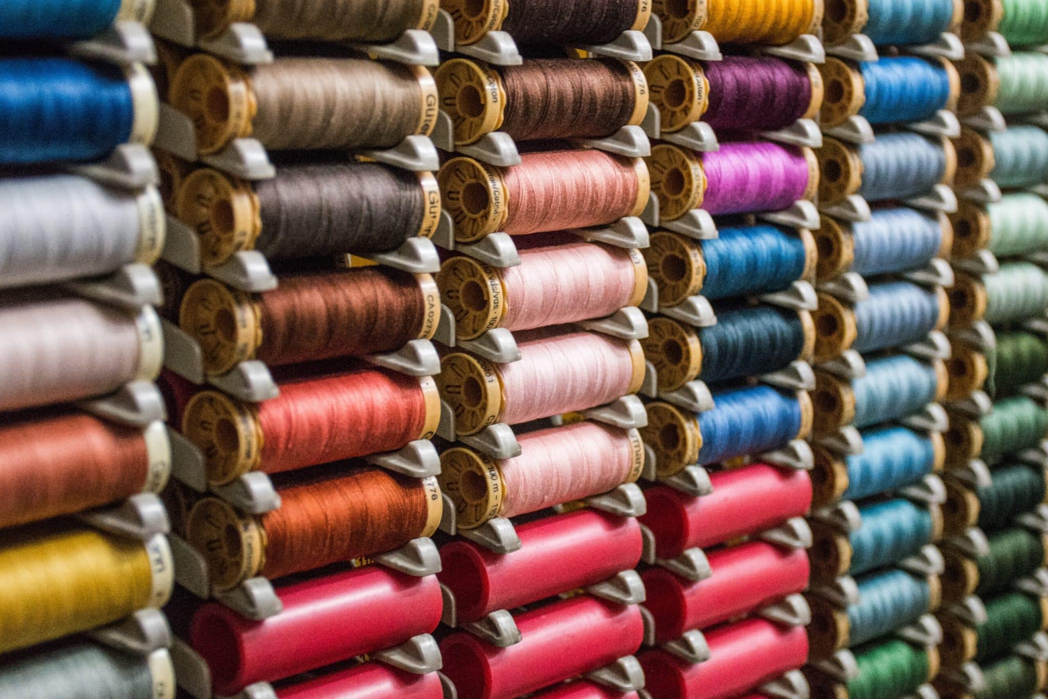 Photo of spools of colorful thread Hector J Rivas for Unsplash