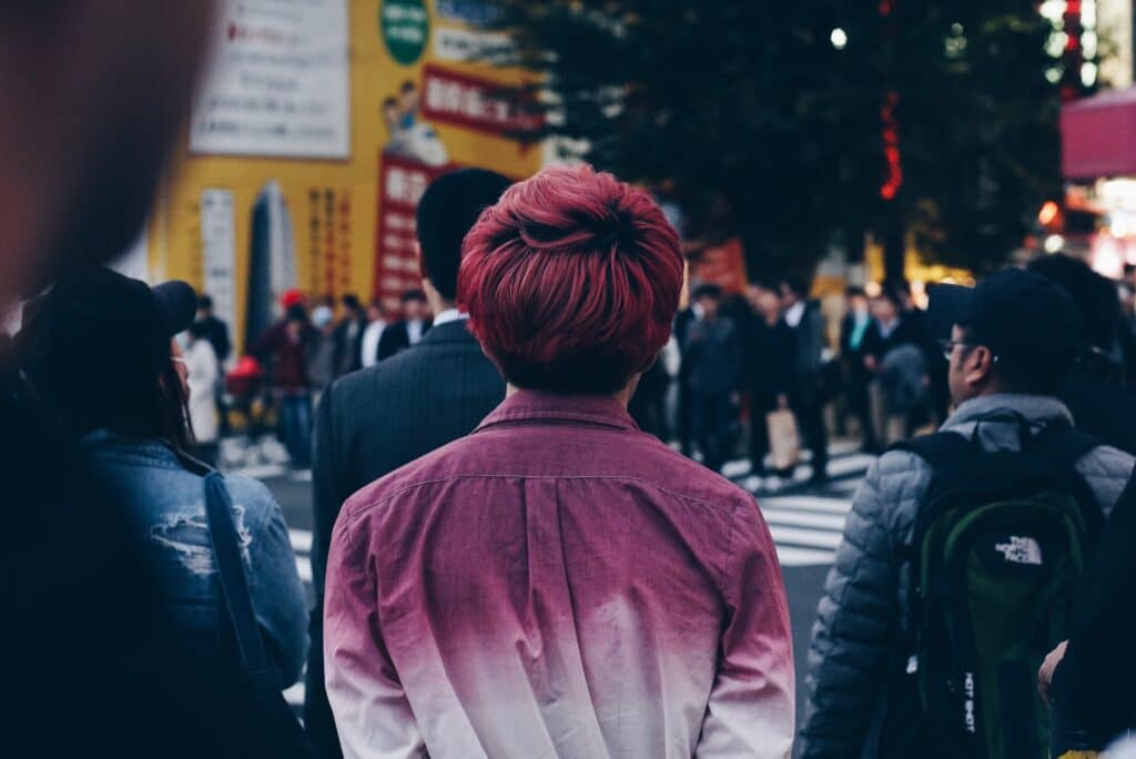 Photo of person with purple hair by Finan Akbar for Unsplash