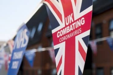 Photo of UK flag Combating Coronavirus by groovelanddesigns