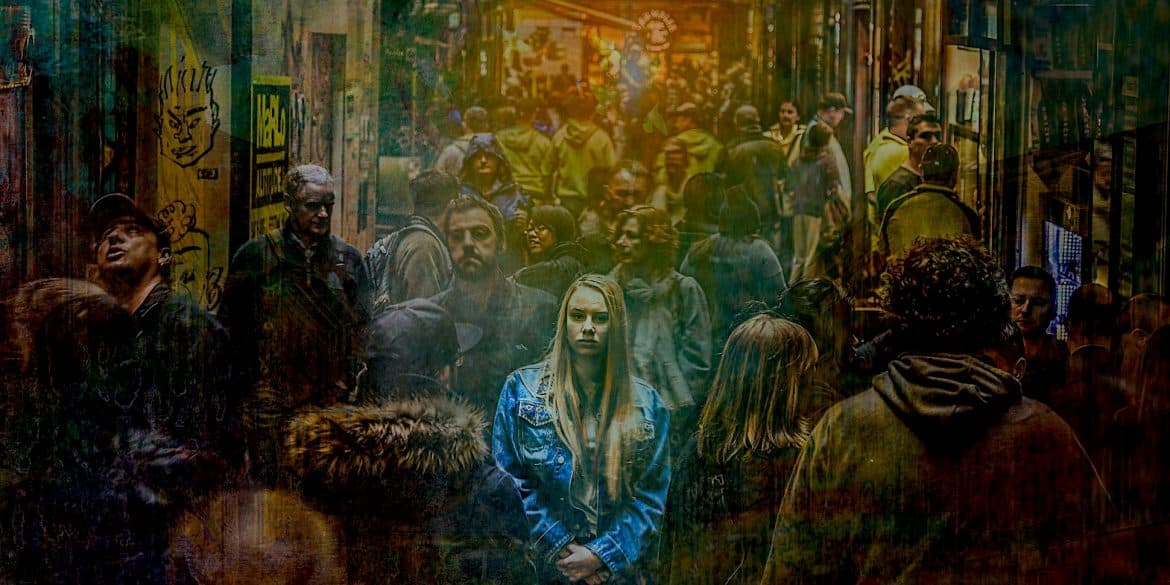 Photo of woman in crowd by Grae Dickason for Pixabay